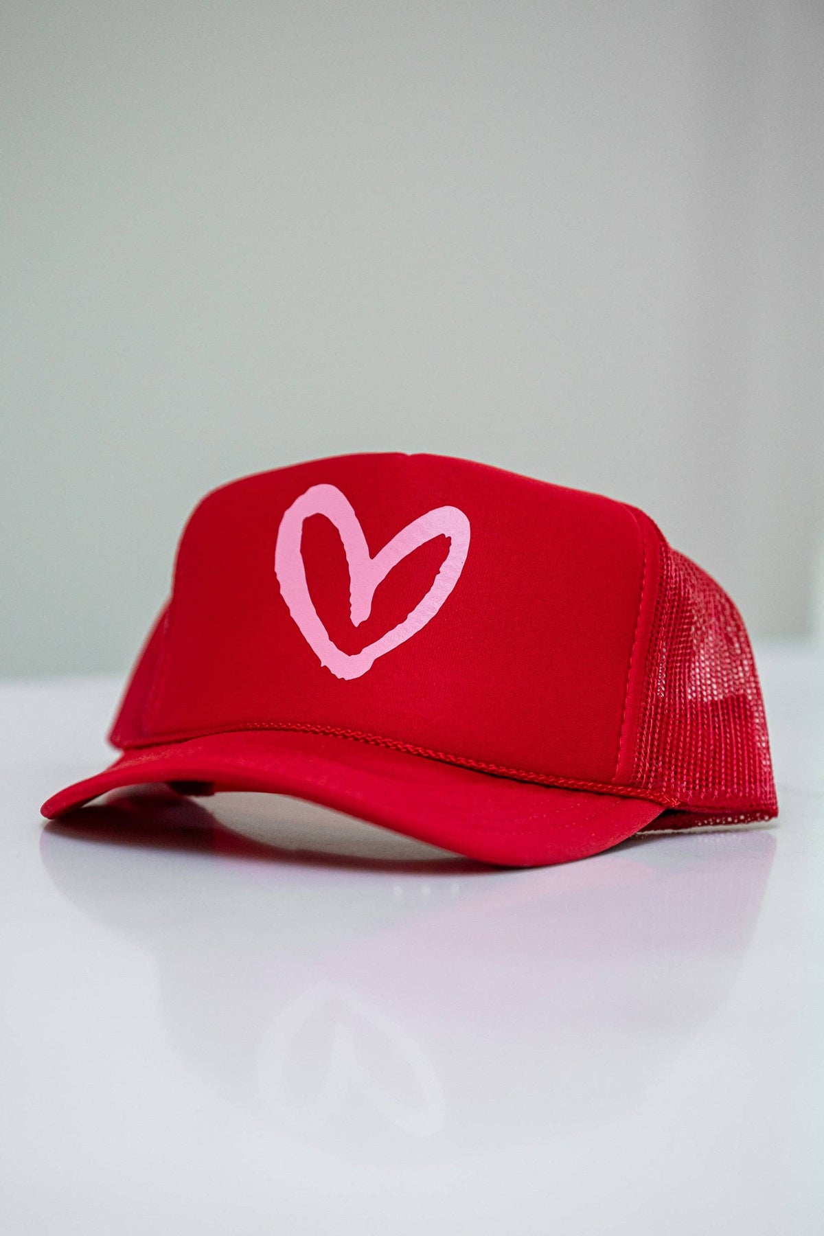 Green House of Shan, INC - Imperfect Heart Trucker Hat - Classic Colorways: Green/Pink